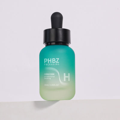 وفقًا لمتطلبات العميل، زجاجات قطارة مصل 30 مل زجاج مستديرة غير لامعة نوع غطاء زجاجة قطارة متين وخيار التعبئة والتغليف